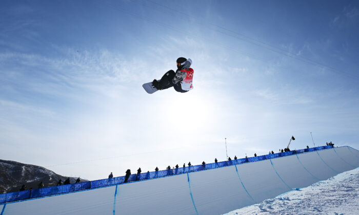 Shaun White of Team United States performs a trick during the Men's Snowboard Halfpipe Final on day 7 of the Beijing 2022 Winter Olympics at Genting Snow Park, in Zhangjiakou, China, on Feb. 11, 2022. (Matthias Hangst/Getty Images)