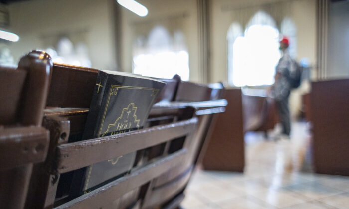 A bible sits placed behind a chair in Iglesia Cristiana Bethel, in Tijuana, Mex., on Feb. 5, 2022. (John Fredricks/The Epoch Times)