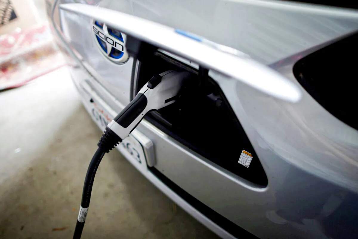 Computer science professor's electric car is plugged in in her garage in Irvine, Calif., on Jan. 26, 2015. (Lucy Nicholson/Reuters)