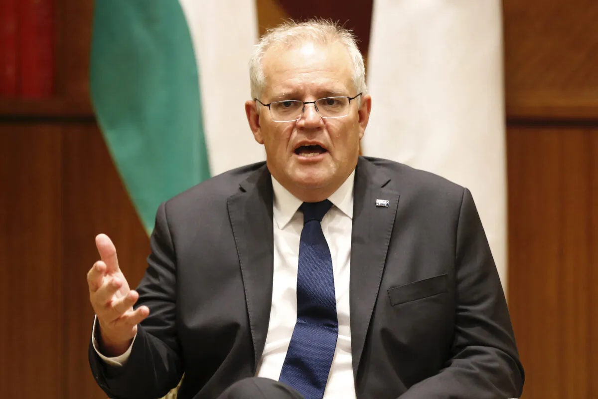 Australian Prime Minister Scott Morrison speaks at the top of a meeting of Australian, United States, India, and Japan foreign ministers at the Melbourne Commonwealth Parliament Offices in Melbourne, Australia, on Feb. 11, 2022. (Darrian Traynor / Pool / AFP via Getty Images)