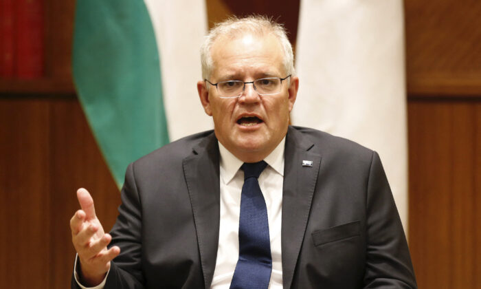 Australian Prime Minister Scott Morrison speaks at the top of a meeting of Australian, United States, India, and Japan foreign ministers at the Melbourne Commonwealth Parliament Offices in Melbourne, Australia, on Feb. 11, 2022. (Darrian Traynor / Pool / AFP via Getty Images)