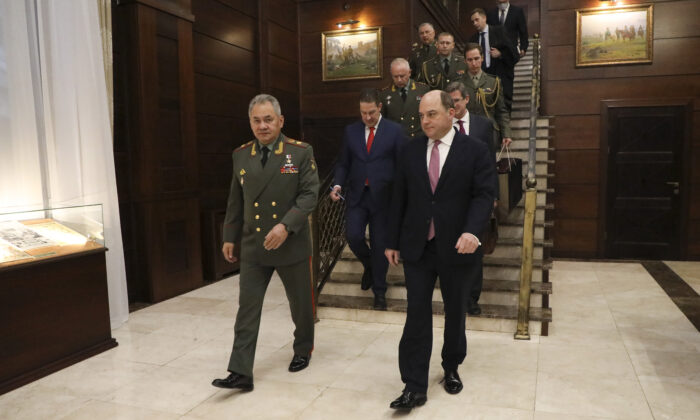 UK Secretary of State for Defence, Ben Wallace (R), and Defence Minister of the Russian Federation, Sergei Shoigu (L), are seen inside the Russian Ministry of Defence building in Moscow on Feb. 11, 2022. (Tim Hammond/MoD Crown Copyright via Getty Images)
