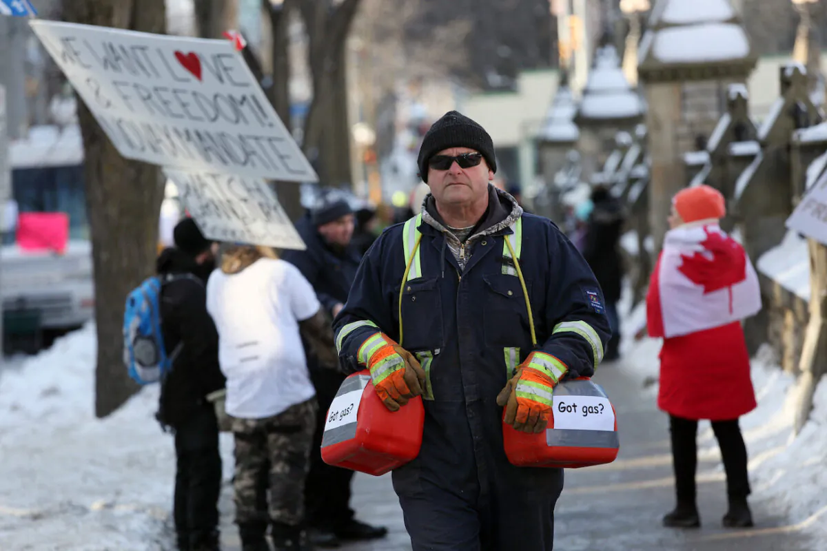 Demonstrators gather near Parliament Hill to protest the government vaccine mandates in Ottawa, Canada, on Feb. 7, 2022. (Dave Chan/AFP via Getty Images)