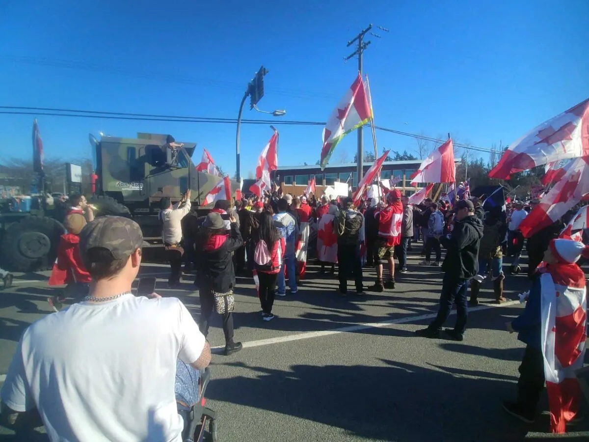 Protesters set up a blockade on the Pacific Highway  to the U.S. border connecting B.C. and Washington state on Feb. 12. (Jeff Sandes/The Epoch Times)
