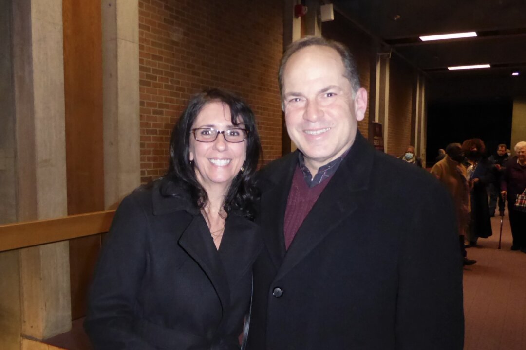 Sales manager Joe Cavataio and Elaina Augustinos attend Shen Yun Performing Arts at The Oncenter Crouse Hinds Theater in Syracuse, N.Y., on Feb. 12, 2022. (Frank Liang/The Epoch Times)