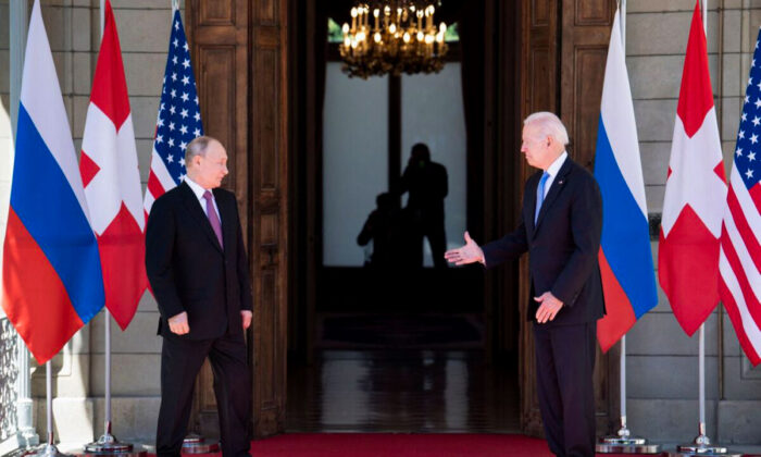President Joe Biden prepares to shake hands with Russian President Vladimir Putin prior to the U.S.–Russia summit at the Villa La Grange, in Geneva, Switzerland, on June 16, 2021. (Brendan Smialowski/AFP)