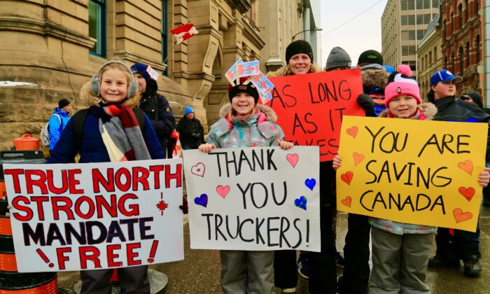 Children participate in the Freedom Convoy protest against COVID-19 mandates and restrictions in Ottawa on Feb. 9, 2022. (Jonathan Ren/The Epoch Times)