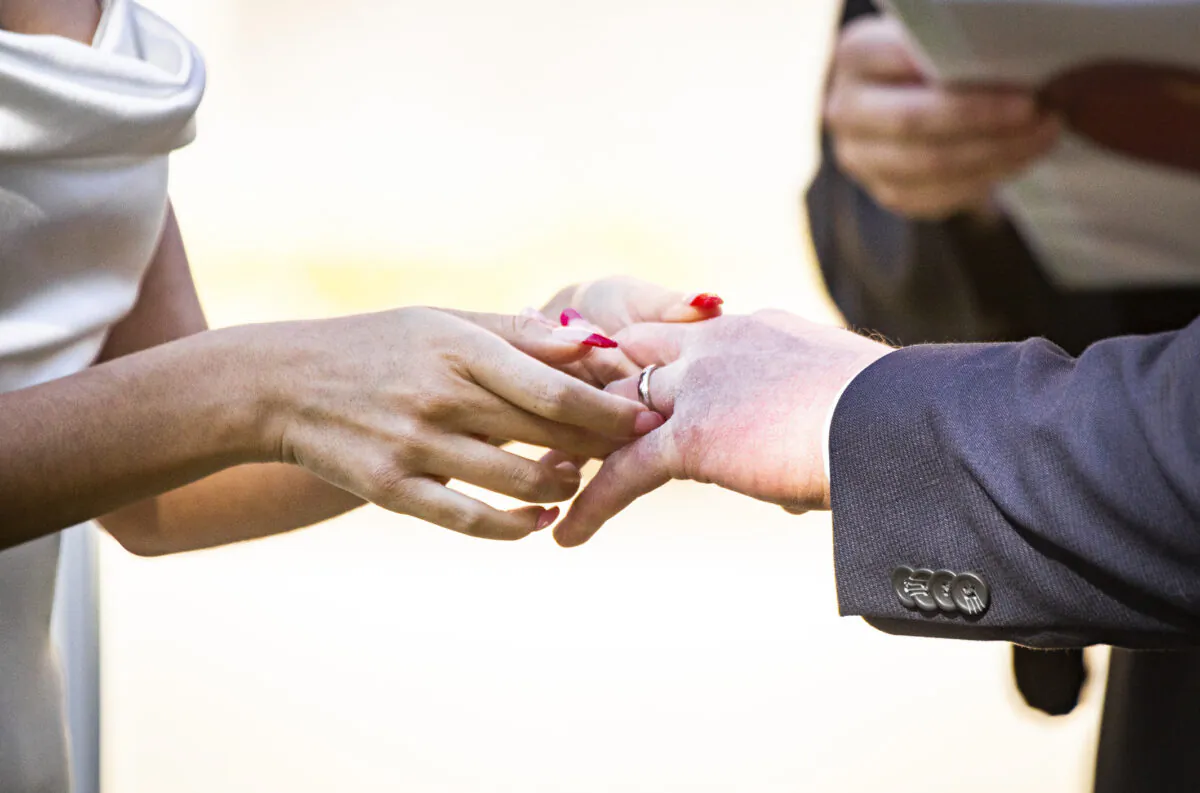 About half American people will attend at least one wedding in 2022. Budgeting for the trip is important. (John Fredricks/The Epoch Times)