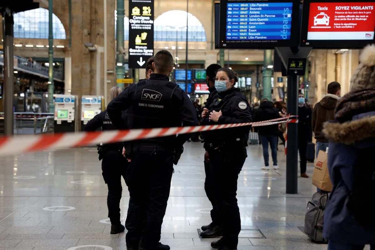 French police secure the scene after French police killed a person who attacked them with a knife at Gare du Nord station in Paris, France, on Feb. 14, 2022. (Benoit Tessier/Reuters)