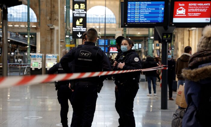 French police secure the scene after French police killed a person who attacked them with a knife at Gare du Nord station in Paris, France, on Feb. 14, 2022. (Benoit Tessier/Reuters)