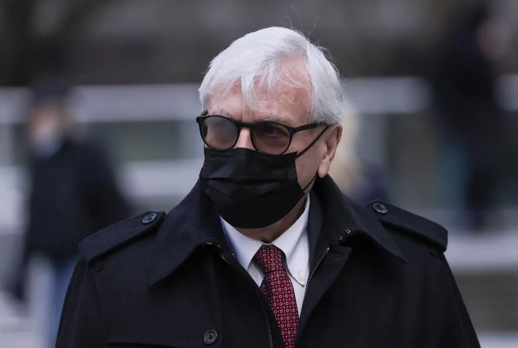 Craig James, former clerk of the British Columbia legislature, leaves B.C. Supreme Court during a break from his trial in Vancouver, on Jan. 26, 2022. (The Canadian Press/Darryl Dyck)