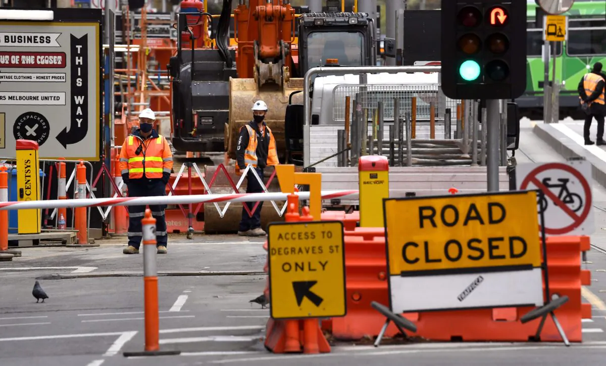 Construction workers are pictured at a building site in Melbourne's city centre in Melbourne, Australia, on Sep. 17, 2020. (William West/AFP via Getty Images)