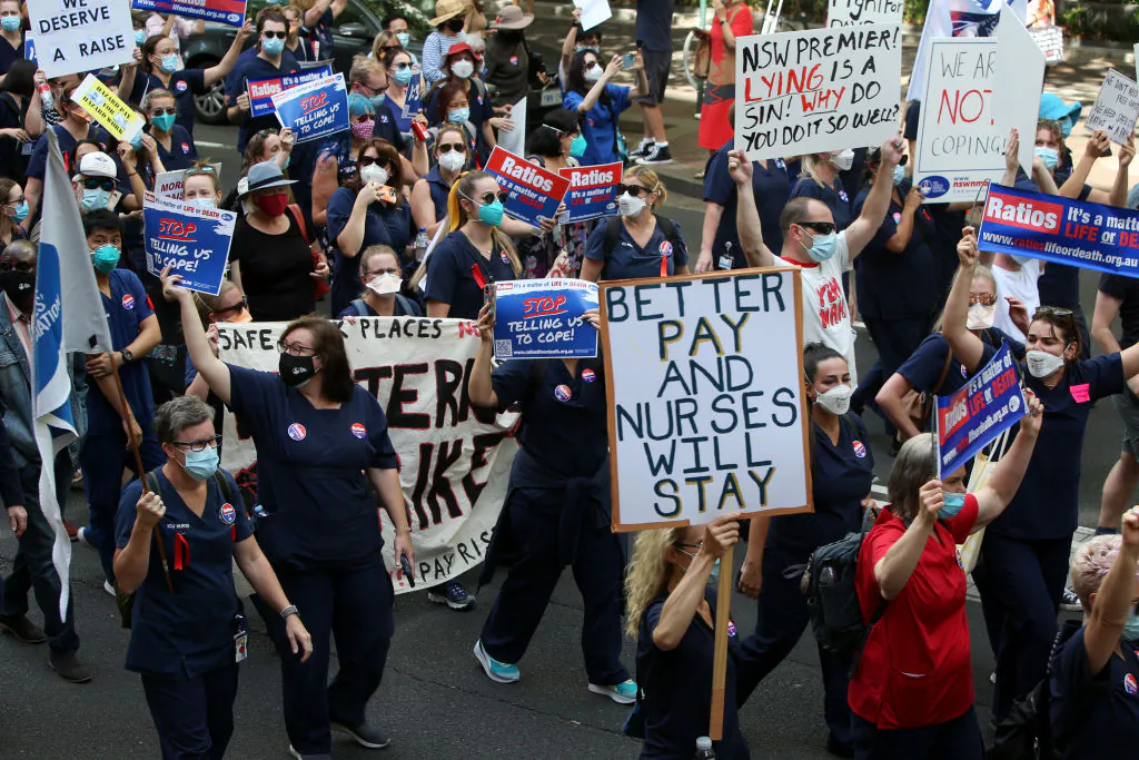 Nurses and members of the health sector rally outside Parliament House in Sydney, Australia, on Feb. 15, 2022. (Lisa Maree Williams/Getty Images)