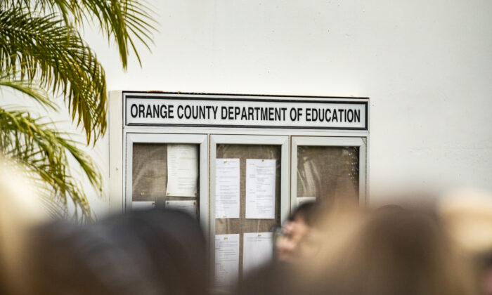 Parents gather in front of the Orange County Department of Education against student mask mandates in Costa Mesa, Calif., on May 17, 2021. (John Fredricks/The Epoch Times)