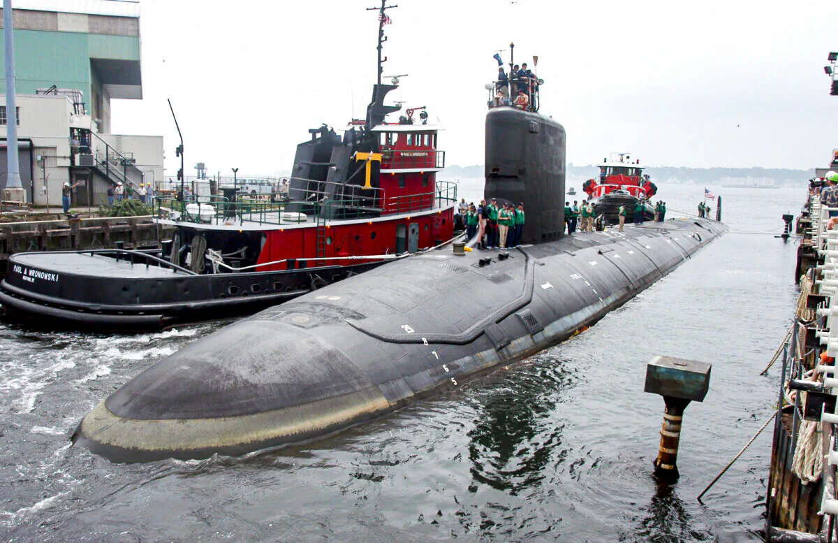 The U.S.S. Virginia returns to the Electric Boat Shipyard in Groton, Conn., after its first sea trials on July 30, 2004. (AP Photo/Jack Sauer, File)