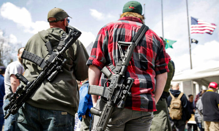 People with firearms at the Washington state capitol during the 'March for Our Rights' pro-gun rally in Olympia, Washington, on April 21, 2018. (JASON REDMOND/AFP/Getty Images)