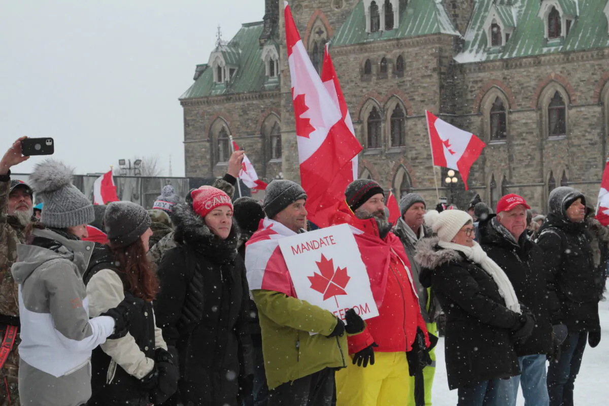 Supporters of the Freedom Convoy gather at Parliament Hill, Ottawa, on Feb. 12, 2022. (Richard Moore/The Epoch Times)