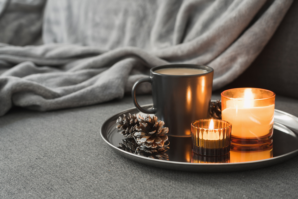 Aroma,Candles,Of,Orange,Color,,Coffee,In,A,Black,Mug