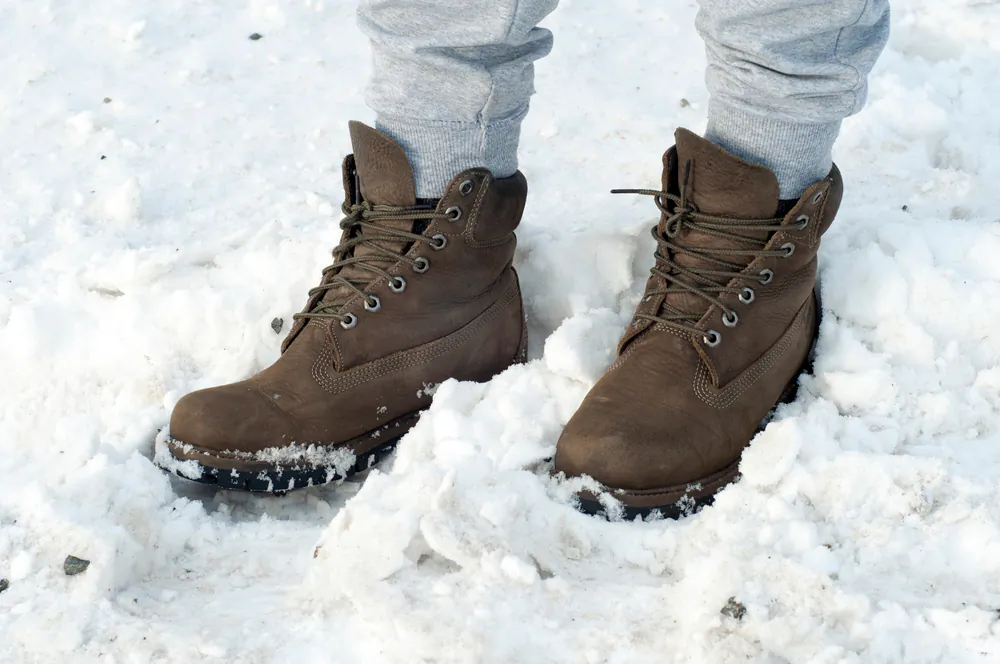Clean dirt and remove salt stains from shoes and boots as soon as you notice them to avoid any permanent damage. (AnkaFed/Shutterstock)