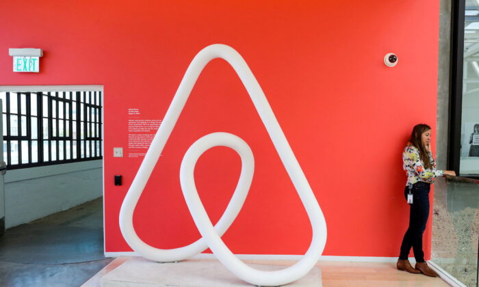 A woman talks on the phone at the Airbnb office headquarters in the SOMA district of San Francisco, on Aug. 2, 2016. (Gabrielle Lurie/Reuters)