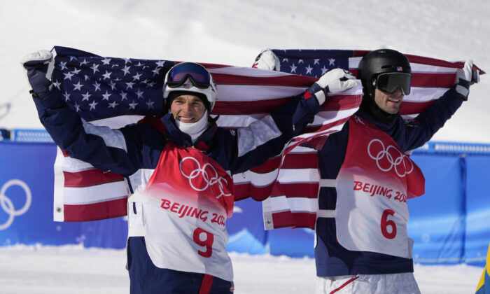 Silver medal winner United State's Nick Goepper (9) and Gold medal winner United States' Alexander Hall (6) celebrates after the men's slopestyle finals at the 2022 Winter Olympics, in Zhangjiakou, China, on Feb. 16, 2022. (AP Photo/Lee Jin-man)