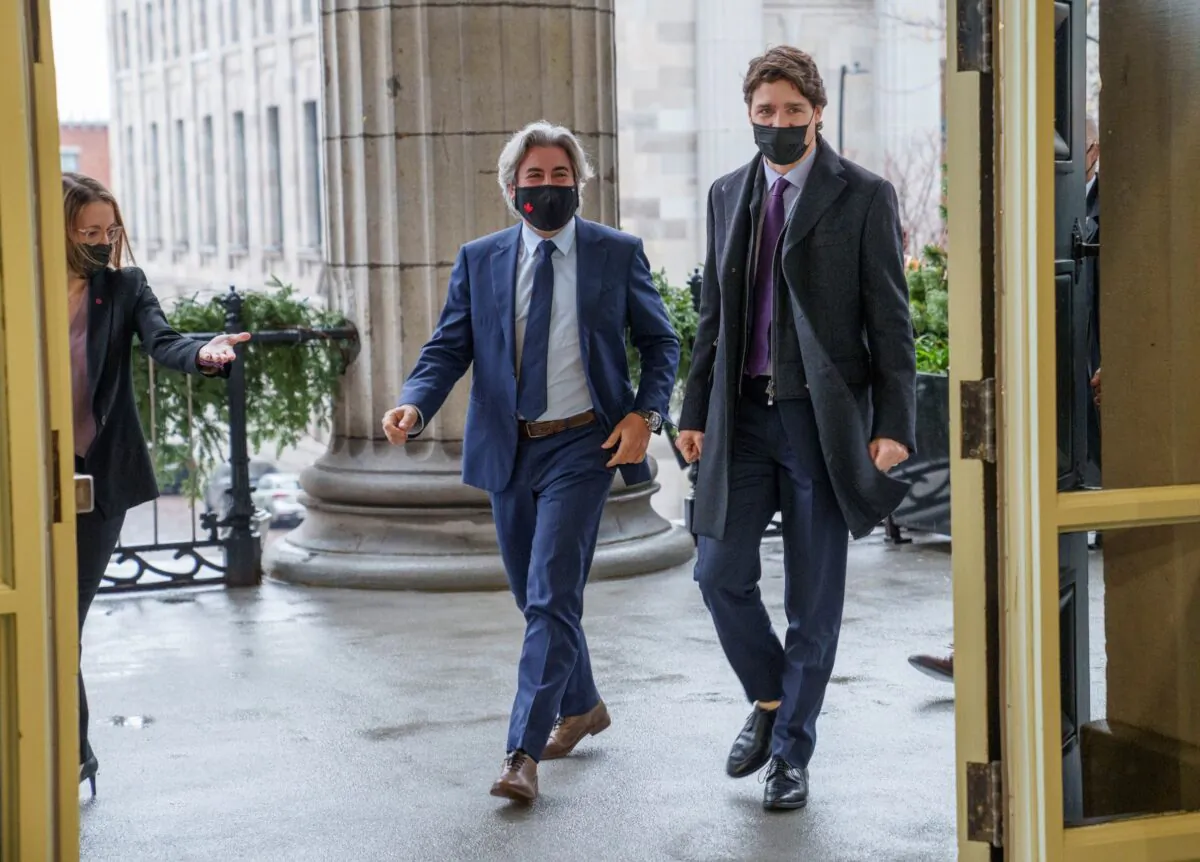 Prime Minister Justin Trudeau and Pablo Rodriguez, now the heritage minister, arrive at City Hall in Montreal on Nov. 26, 2021. (The Canadian Press/Paul Chiasson)