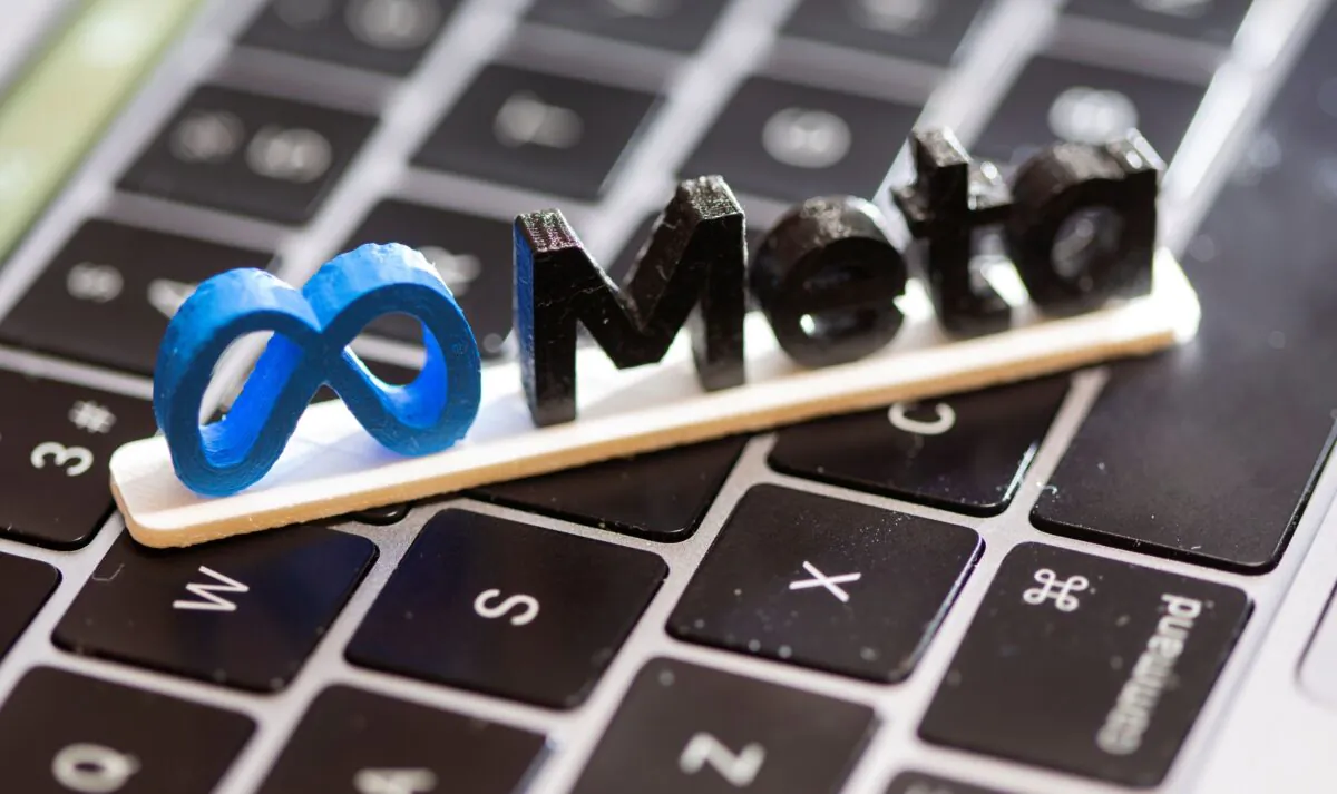 A 3D-print of Facebook's rebrand logo Meta is placed on laptop keyboard in this illustration taken on Nov. 2, 2021. (Dado Ruvic/Illustration/Reuters)