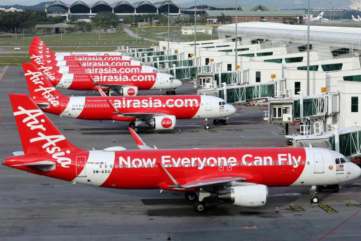 AirAsia planes are seen parked at Kuala Lumpur International Airport 2, amid the coronavirus disease (COVID-19) outbreak in Sepang, Malaysia, on Oct. 6, 2020. (Lim Huey Teng/Reuters)