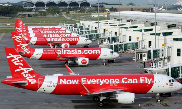 AirAsia planes are seen parked at Kuala Lumpur International Airport 2, amid the coronavirus disease (COVID-19) outbreak in Sepang, Malaysia, on Oct. 6, 2020. (Lim Huey Teng/Reuters)