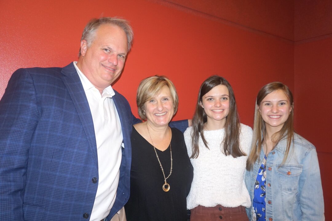 Daniel Quattlebaum and family attend Shen Yun Performing Arts at the Koger Center for the Arts in Columbia, S.C., on Feb. 15, 2022. (Yawen Hung/The Epoch Times)
