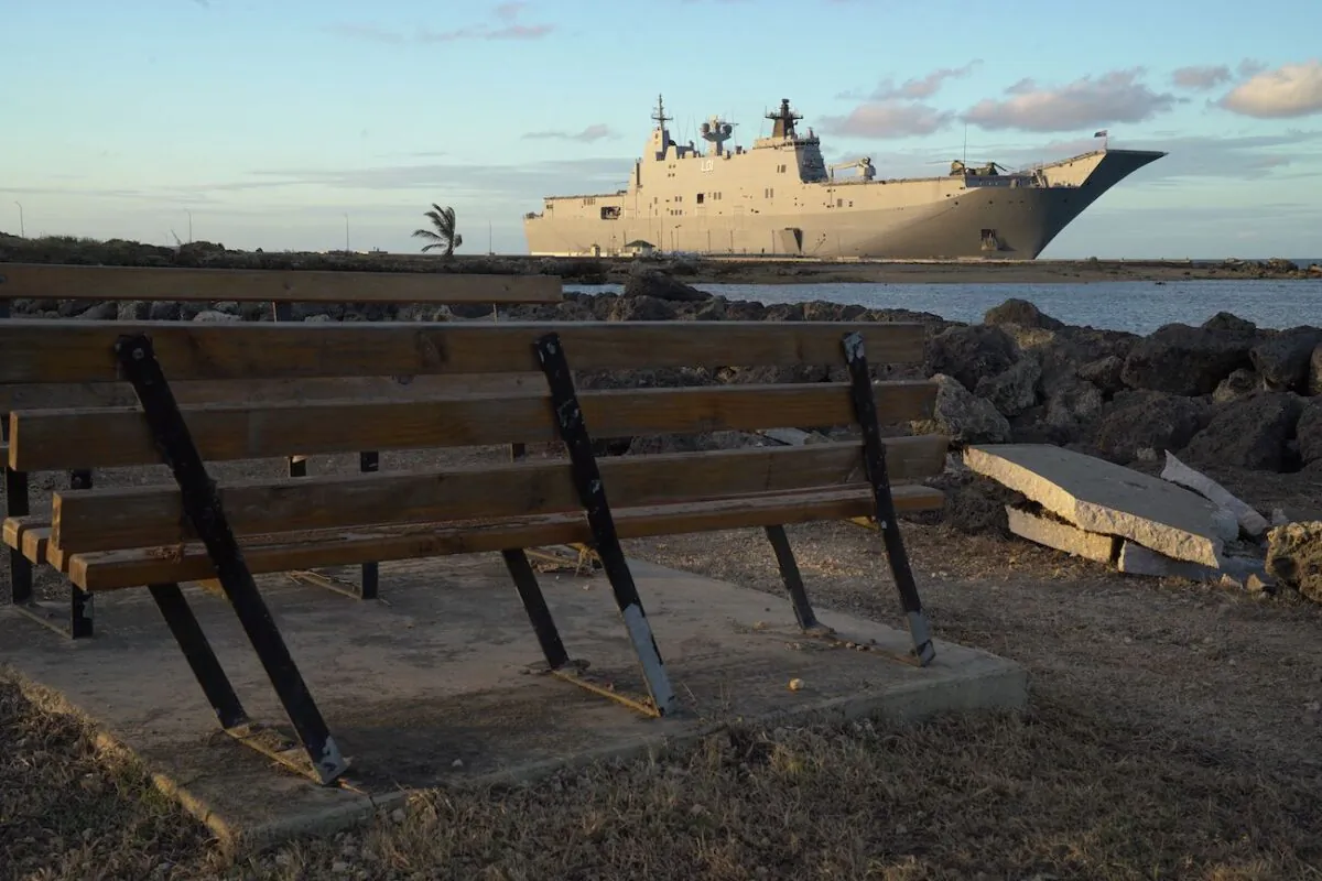 The Australian Navy's HMAS Adelaide docked at Vuna Wharf in Tonga's capital Nukualofa, on Jan. 26, 2022, to deliver aid following the Jan. 15 eruption of the nearby Hunga Tonga-Hunga Haapai underwater volcano. (Mary Lyn Fonua/Matangi Tonga/AFP via Getty Images)