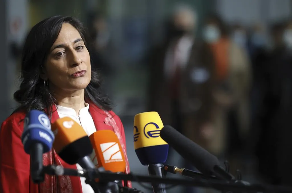 Canadian Defense Minister Anita Anand speaks with the media as she arrives for a meeting of NATO defense ministers at NATO headquarters in Brussels, Feb. 16, 2022. (AP/Olivier Matthys)