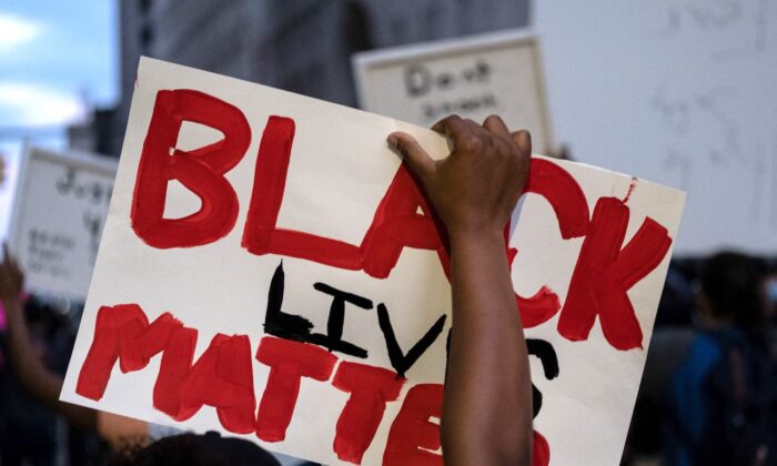 A "Black lives matter" placard during a protest in the city of Detroit, Michigan, on May 29, 2020. (Seth Herald/AFP via Getty Images)