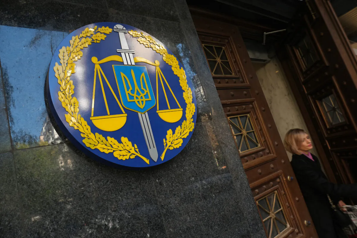 A woman leaves the offices of the Ukrainian general prosecutor in Kyiv, Ukraine, on Oct. 2, 2019. (Sean Gallup/Getty Images)