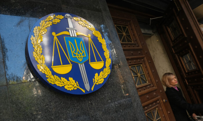 A woman leaves the offices of the Ukrainian general prosecutor in Kyiv, Ukraine, on Oct. 2, 2019. (Sean Gallup/Getty Images)