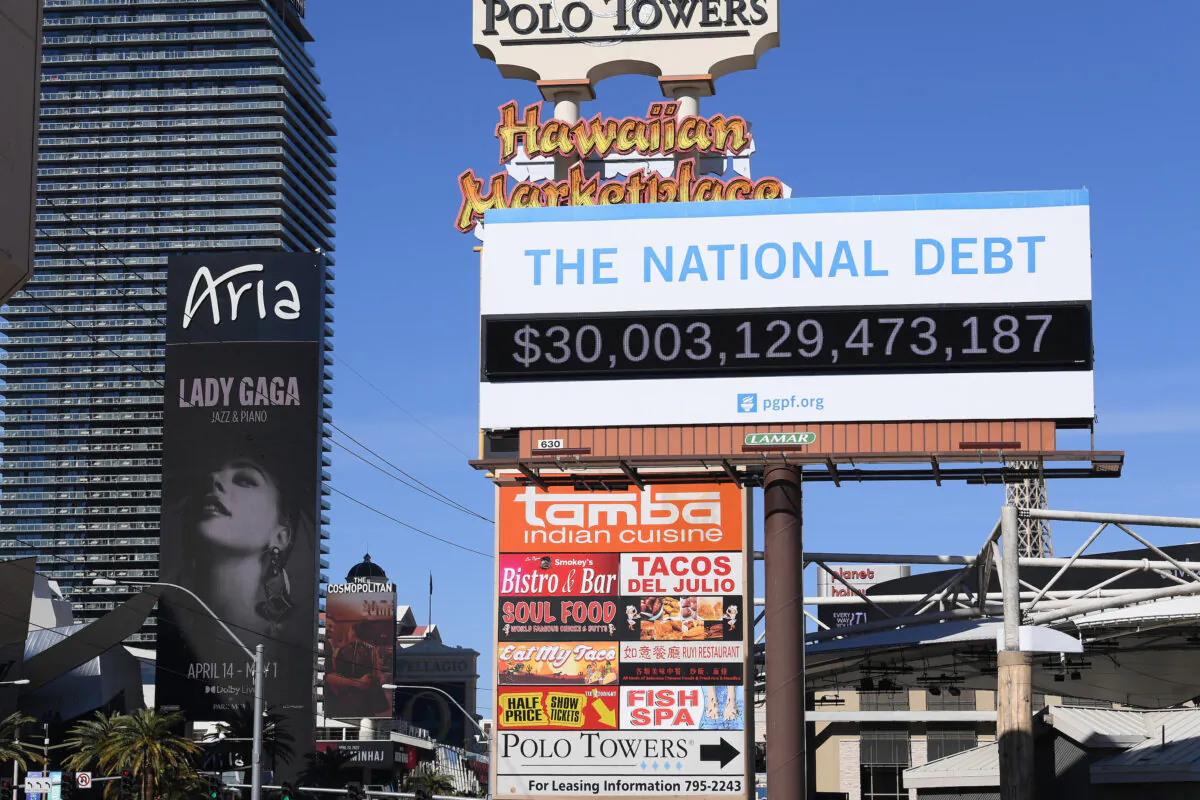 A Peterson Foundation billboard displaying the national debt and each American's share is pictured in Las Vegas, Nev., on Feb. 8, 2022. (Bryan Steffy/Getty Images for Peter G. Peterson Foundation)