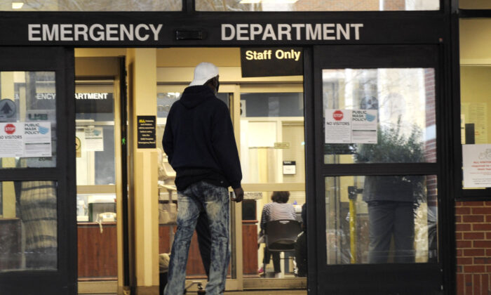 A man enters the emergency room at UAB Hospital in Birmingham, Ala., on Jan. 5, 2022. . (Jay Reeves/AP Photo)