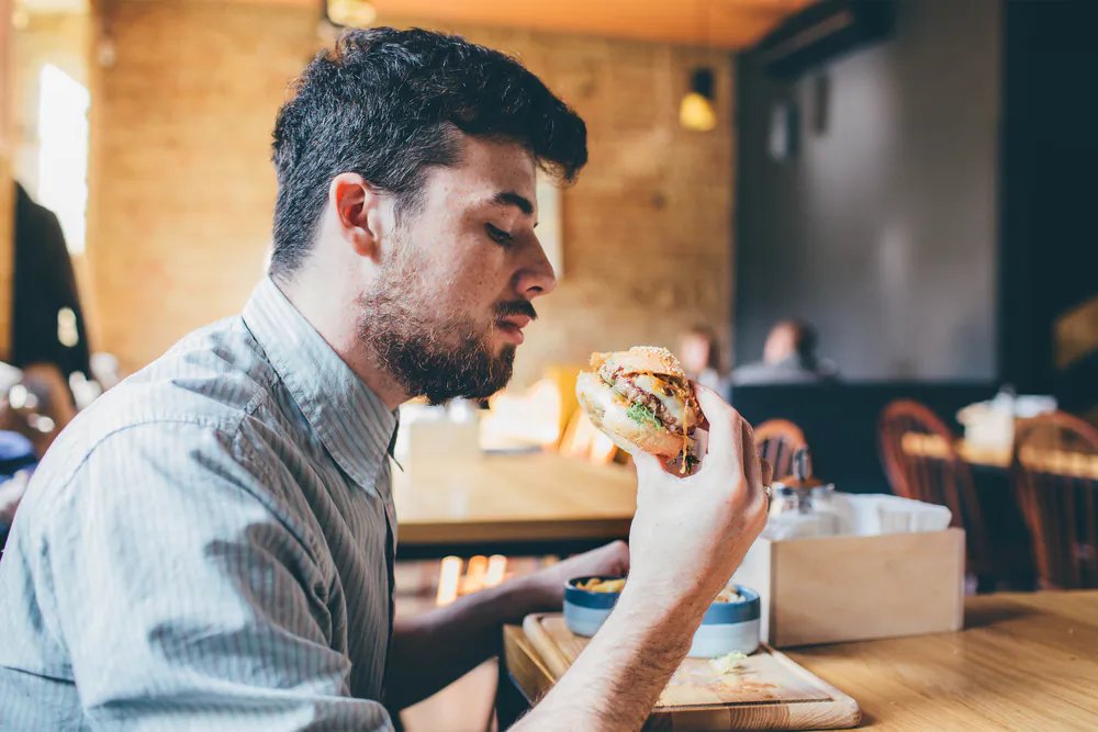 Junk food diets lead to a higher risk of colorectal, stomach cancers, and cancers of the respiratory tract. (Shutterstock)