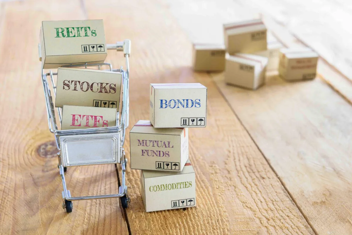 Cartons of financial investment products in a shopping cart. (Shutterstock)