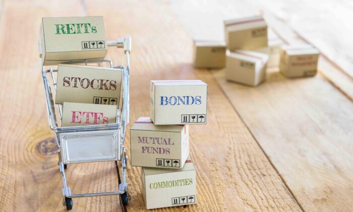 Cartons of financial investment products in a shopping cart. (Shutterstock)