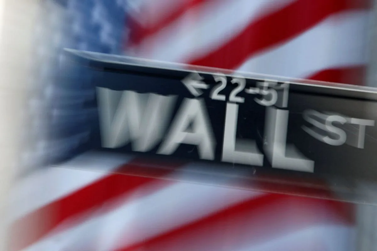 A street sign on Wall Street outside the New York Stock Exchange, on Sept. 18, 2007. (Brendan McDermid/Reuters)