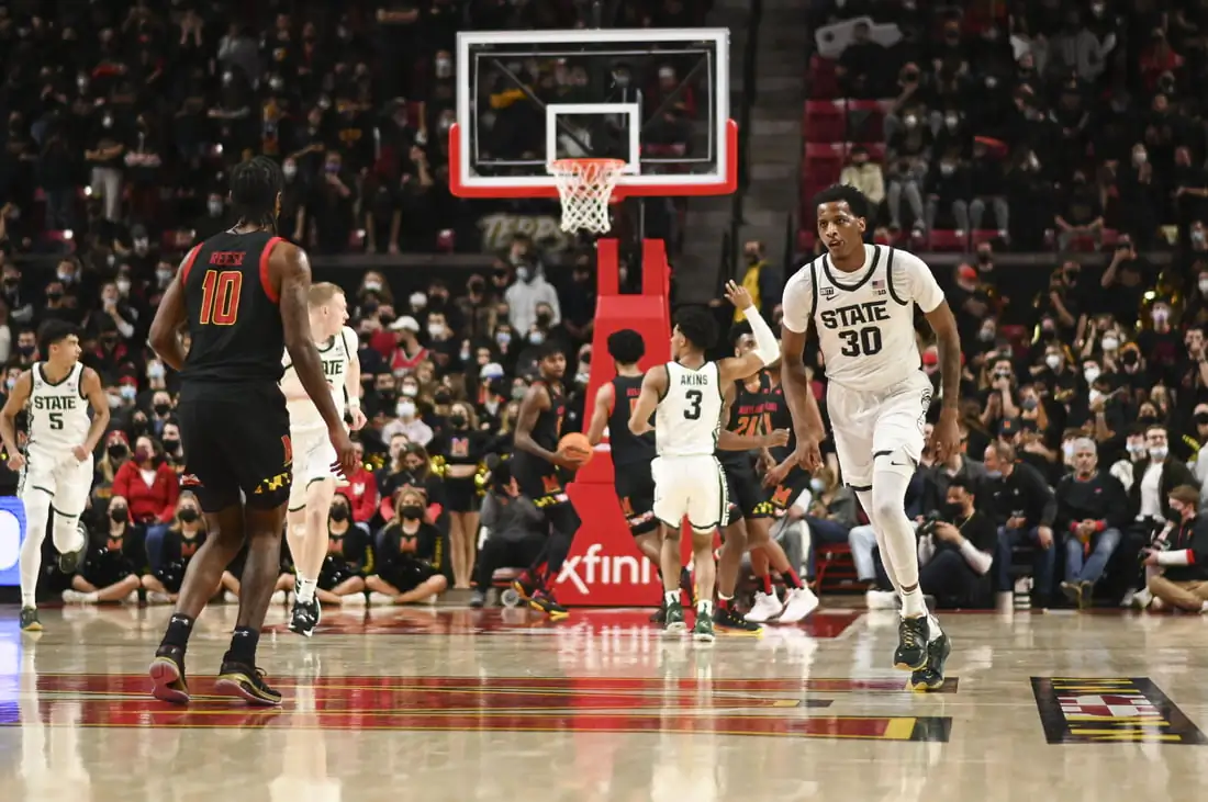 Michigan State Spartans forward Marcus Bingham Jr. (30) reacts after making a three point shot during the second half against the Maryland Terrapins at Xfinity Center in College Park, Md., on Feb 1, 2022. (Tommy Gilligan/USA TODAY Sports via Field Level Media)