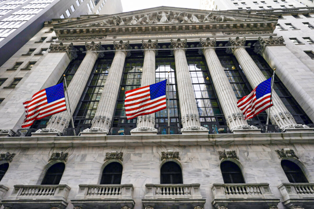American flags fly outside the New York Stock exchange on Jan. 14, 2022. (Mary Altaffer/AP Photo)