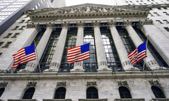 American flags fly outside the New York Stock exchange on Jan. 14, 2022. (Mary Altaffer/AP Photo)