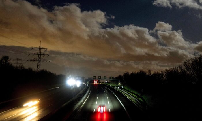 Stormy clouds drift over a highway in Frankfurt, Germany, on Feb. 17, 2022. (Michael Probst/AP Photo)