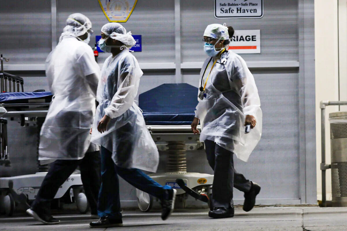 Medical workers walk outside a special coronavirus area at Maimonides Medical Center in the Borough Park neighborhood of the Brooklyn borough of New York on May 26, 2020. (Spencer Platt/Getty Images)