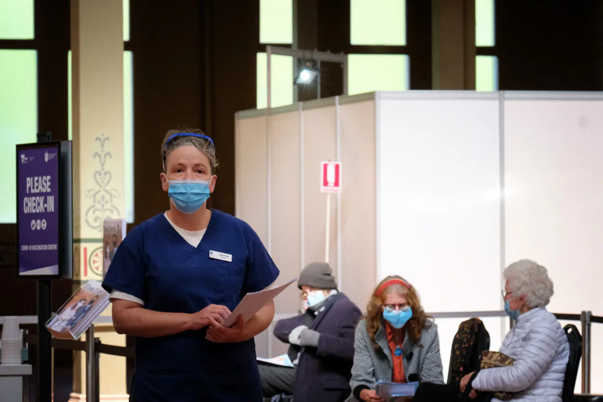 Nursing staff at the mass vaccination hub at the Royal Exhibition Building in Melbourne, Australia, on April 21, 2021. (Luis Ascui - Pool/Getty Images)