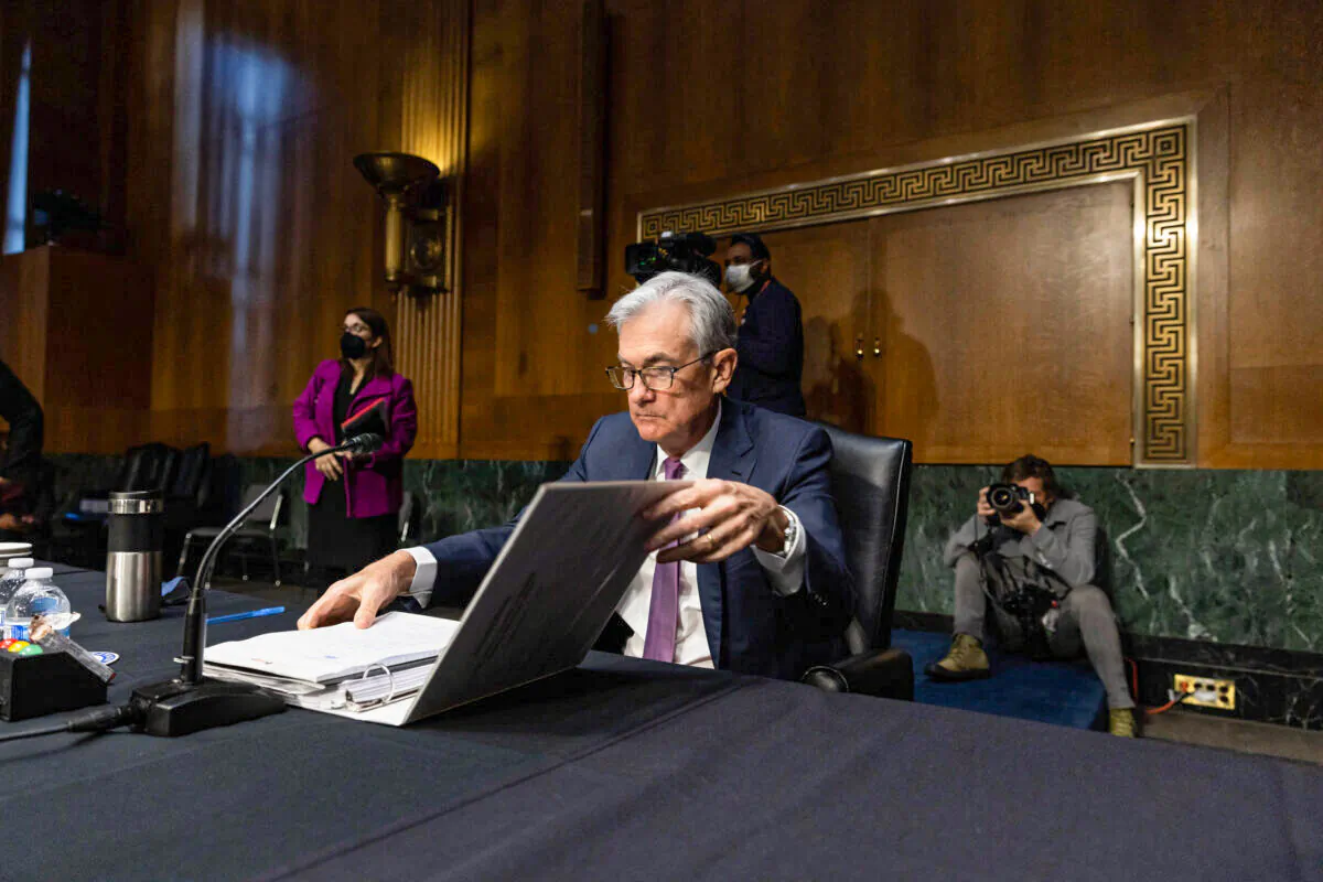 Jerome H. Powell, Chair of the Board of Governors of the Federal Reserve, prepares to leave at the end of a confirmation hearing before the Senate Banking, Housing and Urban Affairs Committee in Washington, on Jan. 11, 2022. (Graeme Jennings-Pool/Getty Images)