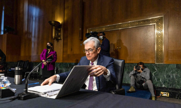 Jerome H. Powell, Chair of the Board of Governors of the Federal Reserve, prepares to leave at the end of a confirmation hearing before the Senate Banking, Housing and Urban Affairs Committee in Washington, DC. on Jan. 11, 2022. (Graeme Jennings-Pool/Getty Images)