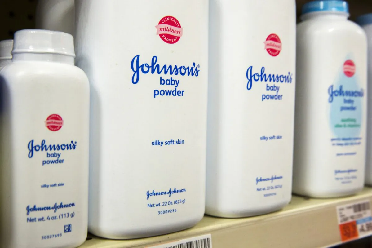 Bottles of Johnson & Johnson's baby powder line a drugstore shelf in New York on Oct. 15, 2015. (Lucas Jackson/Reuters)